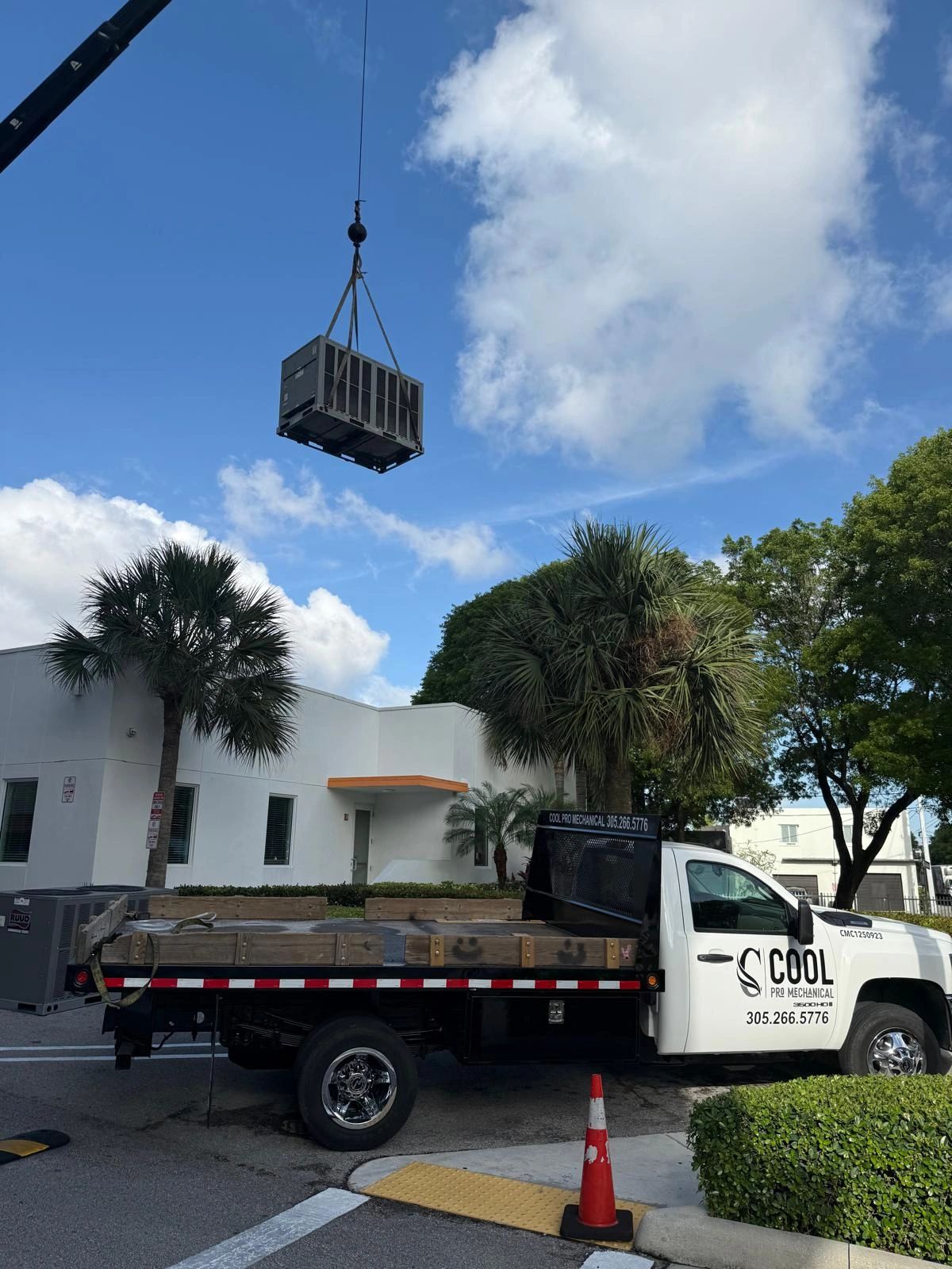 Cool Pro Mechanical crane installation of commercial HVAC unit